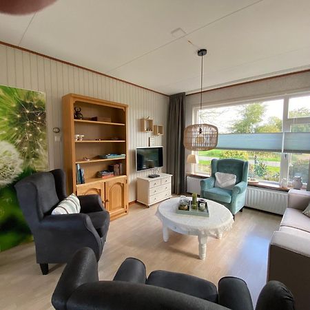 Huis Bij Het Water Met Sloepje Jutrijp Extérieur photo