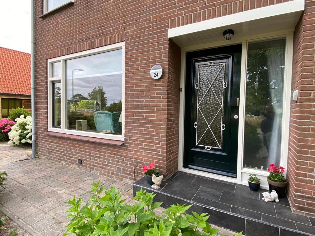 Huis Bij Het Water Met Sloepje Jutrijp Extérieur photo